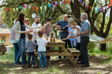 Cheers family in the garden