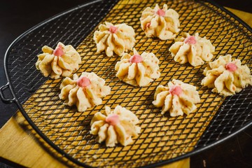 Kuih Semperit is a Malaysian traditional cookie, traditionally served during Hari Raya Aidilfitri to visiting guests. Semperit is made of wheat flour, corn flour, custard powder, sugar and margarine. 