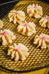 Kuih Semperit is a Malaysian traditional cookie, traditionally served during Hari Raya Aidilfitri to visiting guests. Semperit is made of wheat flour, corn flour, custard powder, sugar and margarine. 