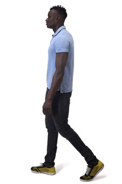 african man walking on white background