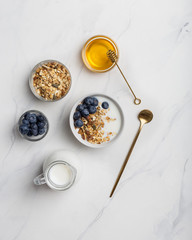 Porridge with nuts, yogurt and berries