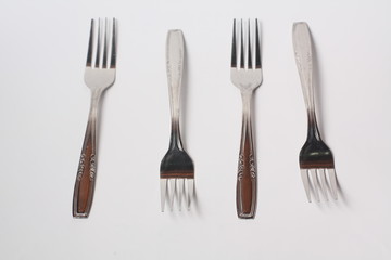Cutlery , spoon and fork on white background
