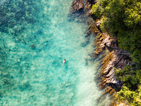 Woman snorkeling in the South China Sea, Malaysia