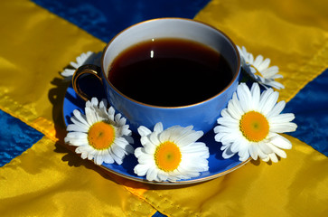 Swedish fika or coffee with Swedish flag.