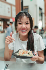 Women are eating Gyoza