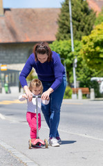Scooter. Sunny. Day. Ride. Street. Daughter. Mother