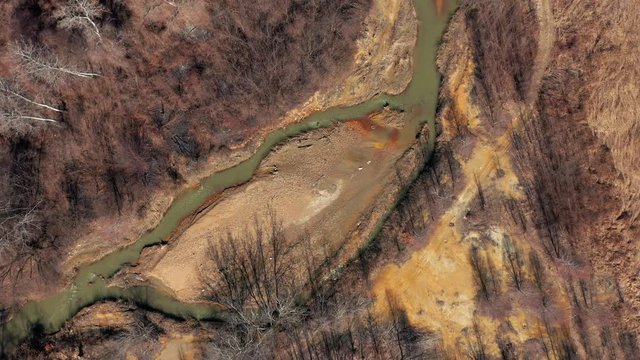 Coastal area of mine drainage polluted  river 4K drone footage