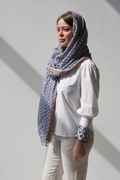 Elegant woman wearing contemporary oriental outfit