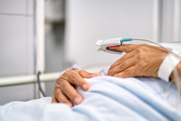 Checking the pulse on a patient