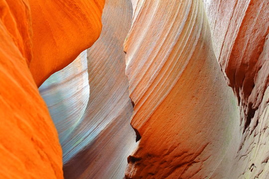 Magical colours and textures inside red rocks of Slot Canyon
