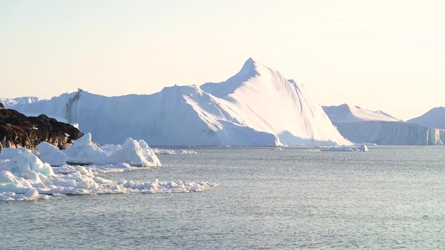 Arctic icebergs floatin on arctic ocean in greenland