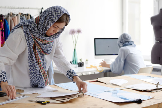 Women working in modern tailor shop
