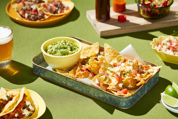 Tacos with pickled cucumbers and guacamole.