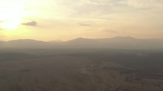 Silhouettes of mountains Deli Jovan and Stol before sunset 4K aerial video