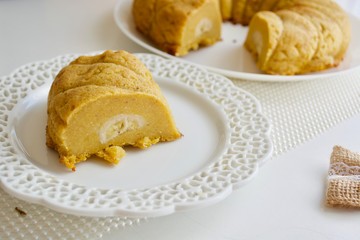 Tasty banana cake on the white plate