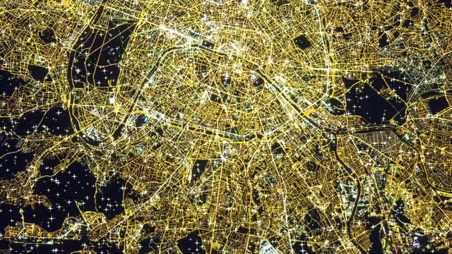Night lights Paris France landscape aerial satellite view animation. Contains public domain image by Nasa