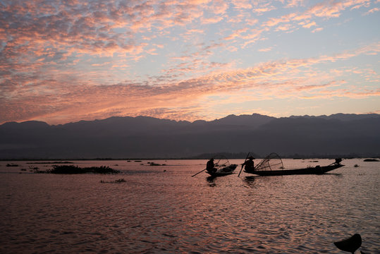 Two traditional Shan fishermen at Inle Lake, Myanmar.