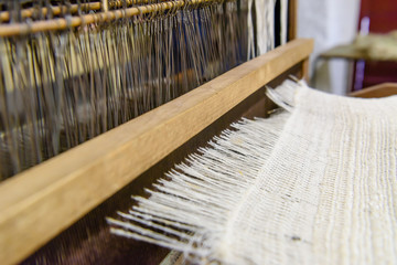 Linen being woven on a loom at the Wellbrook Beetling Mill, Cookstown, Northern Ireland