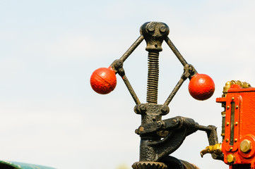 Iron balls on the Centrifugal governor mechanism of a traction engine - used to control the speed...