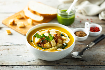 Pumpkin soup with homemade pesto sauce
