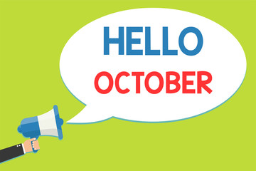Word writing text Hello October. Business concept for Last Quarter Tenth Month 30days Season Greeting Man holding megaphone loudspeaker speech bubble message speaking loud