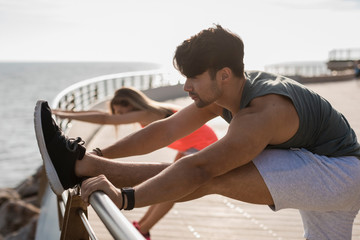 Fit couple jogging in the city