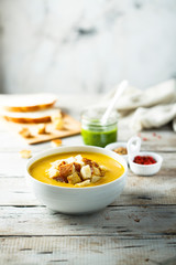 Pumpkin soup with homemade pesto sauce