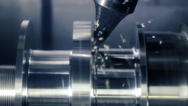 Metalworking CNC lathe milling machine. Cutting metal modern processing technology.