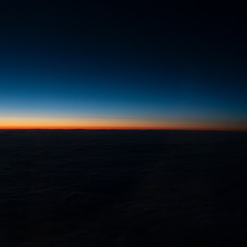 Sunset seen from airplane window