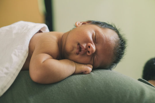 A sleeping newborn