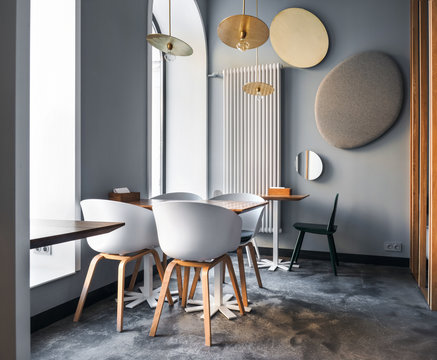Chairs and tables in nice cafe