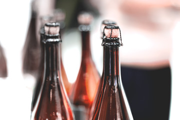 Glass champagne bottles with stoppers