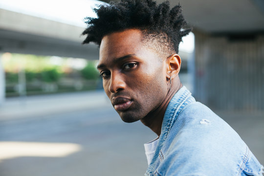 Portrait Of A Handsome Young Man Looking At The Camera