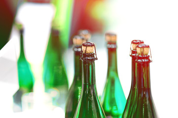 Glass champagne bottles with stoppers