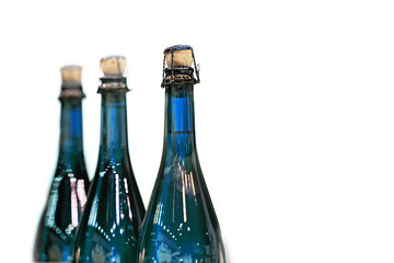 Glass champagne bottles with stoppers