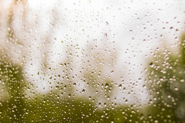 background glass with water drops after rain