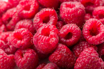 Fresh and sweet raspberries background