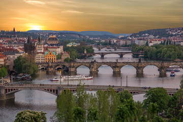 Fototapeta na wymiar Prague bridges, city sunset panorama, Czech Republic