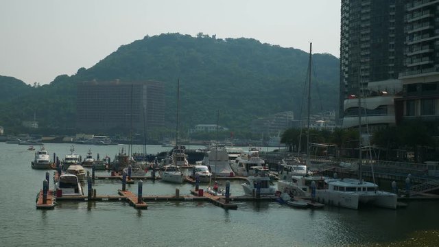 day time sanya city bay yacht dock bridge panorama 4k hainan china