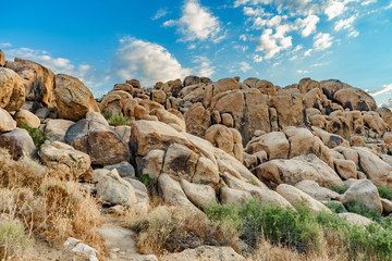 Fototapeta na wymiar Boulder formation hill at Apple Valley, California, in the Mojave Desert.