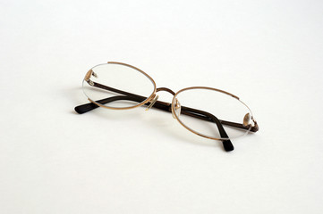 Black eye glasses spectacles with shiny black frame For reading daily life To a person with visual impairment. White background as background health concept with copy space.