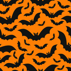 Halloween pattern with bats, vector seamless pattern with black bats on orange background - 270661403