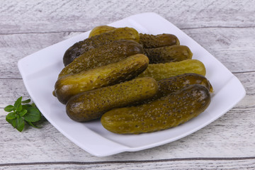 Pickled cucumbers heap in the bowl