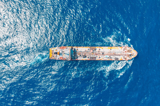 Oil Chemical Tanker Sails Blue Sea. Aerial Top View