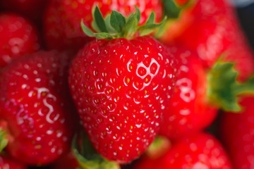 Beautiful strawberry closeup. Macro image of fresh strawberries