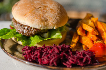 Home made hamburger with sweet potatoes.