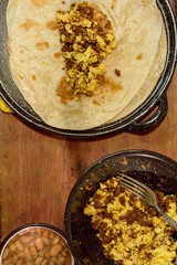 Mexican breakfast, making burritos with machaca