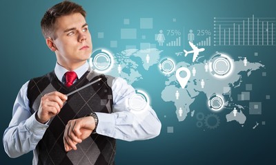 Businessman and  business symbols on  background