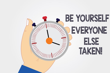 Naklejka premium Handwriting text writing Be Yourself Everyone Else Is Taken. Concept meaning Have and show your own demonstratingality Hu analysis Hand Holding Mechanical Stop Watch Timer with Start Stop Button