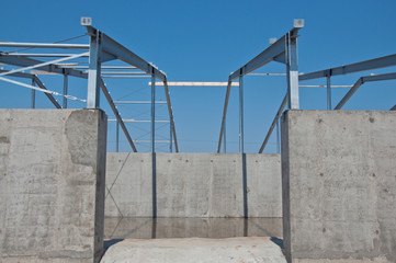 Structure of steel for building construction. The steel structure of the new building for further construction. Metal frame for the installation of insulation panels.